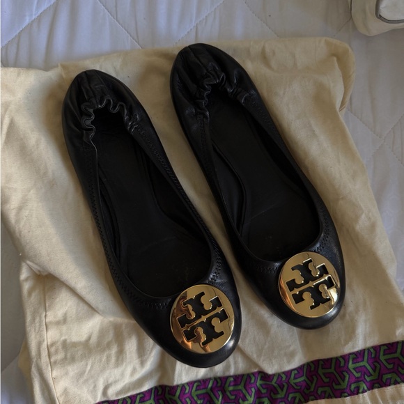 Tory Burch Black Flats with Gold Emblem - Picture 2 of 3